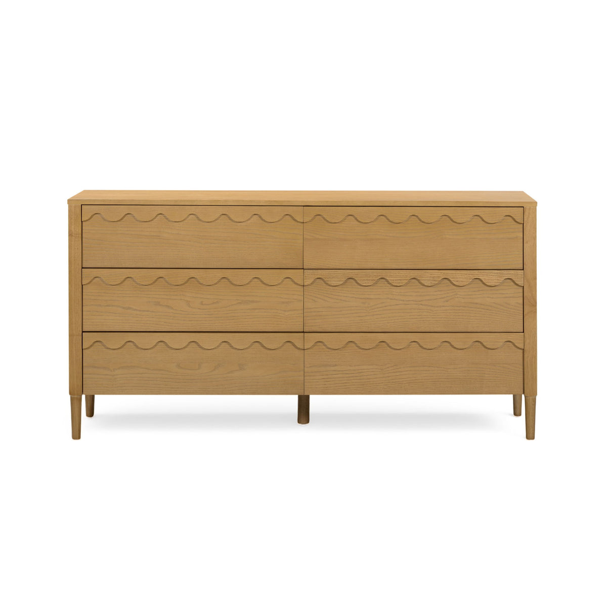 Light brown 6-drawer dresser with wavy drawer fronts and tapered wooden legs