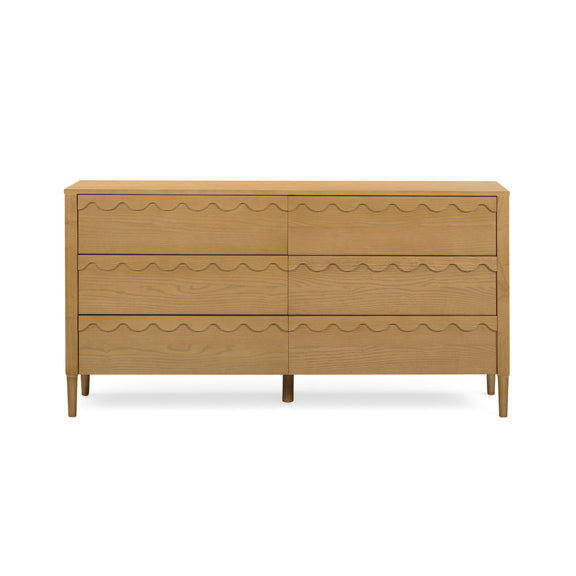 Light brown 6-drawer dresser with wavy drawer fronts and tapered wooden legs