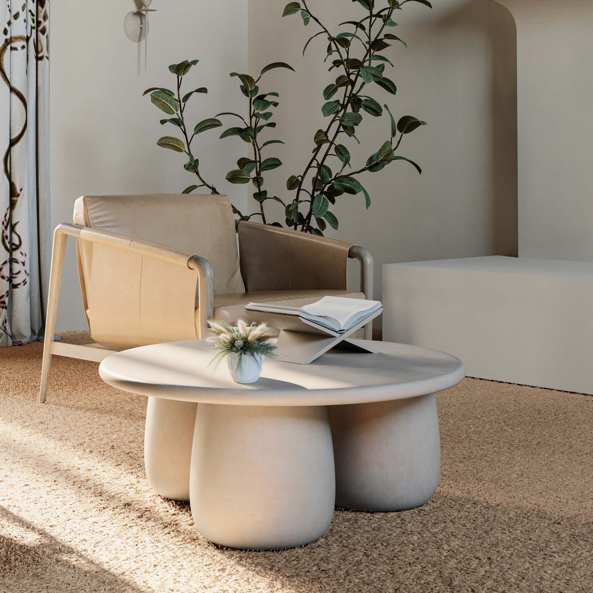 Rahul round coffee table, cream round top on three pedestal bases