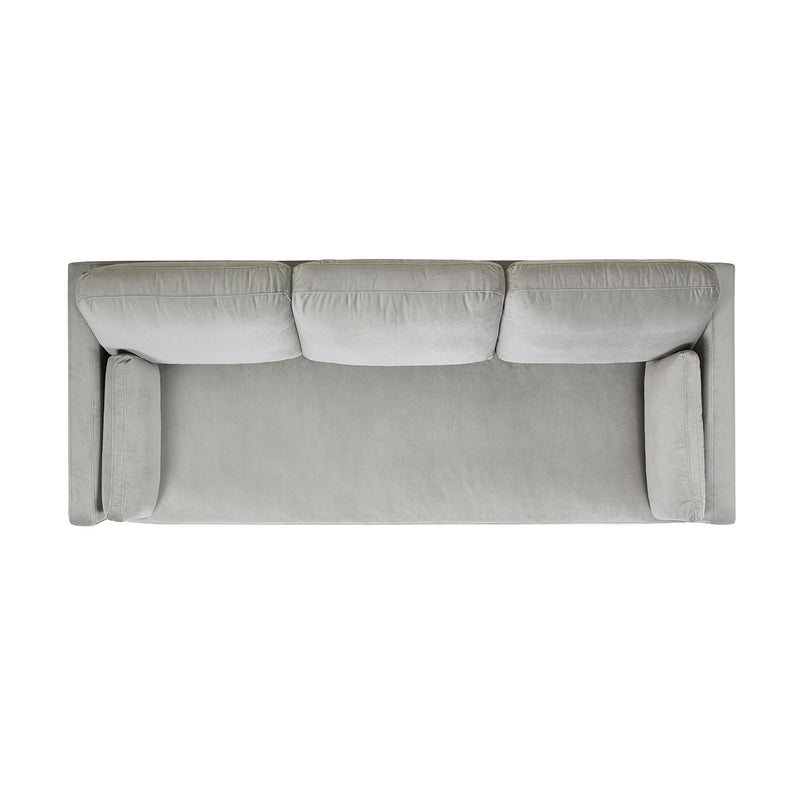 Modern farmhouse sofa in light gray with three back cushions and rounded arms