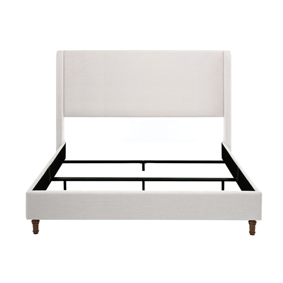Ivory king bed with upholstered wingback headboard, fabric side rails, and wooden feet