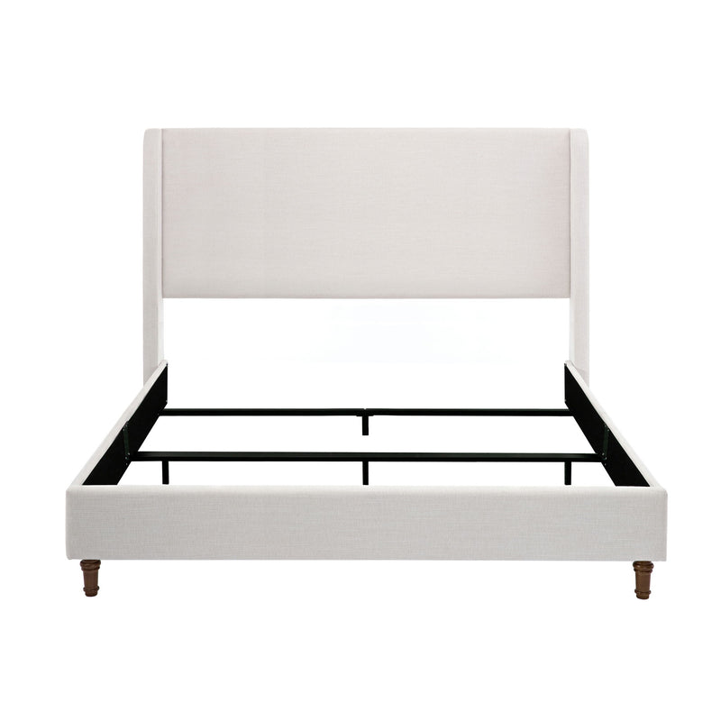 Ivory king bed with upholstered wingback headboard, fabric side rails, and wooden feet