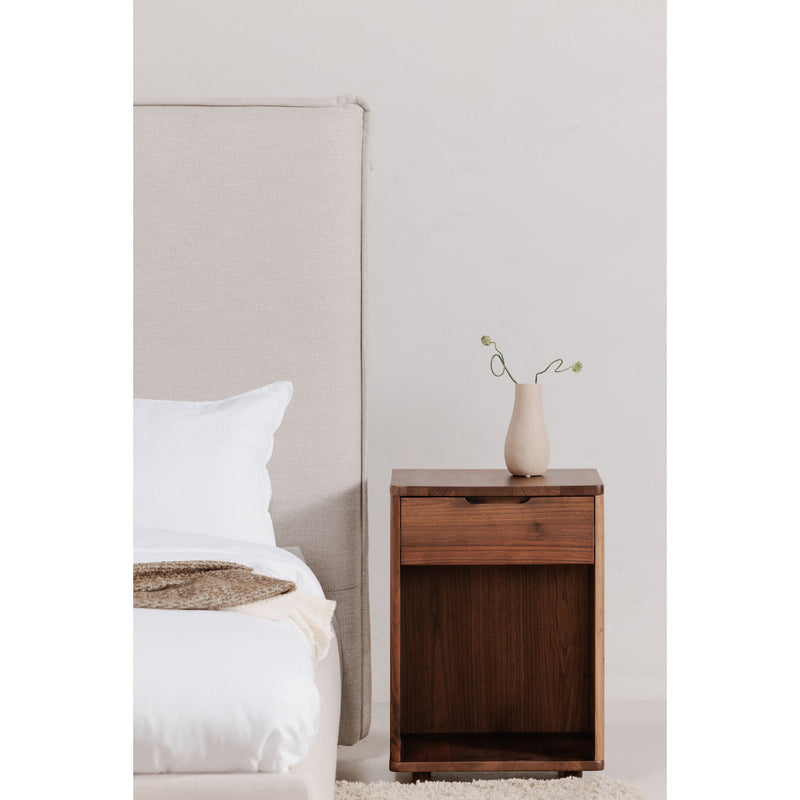 Wheat upholstered king bed headboard with side view and pillow