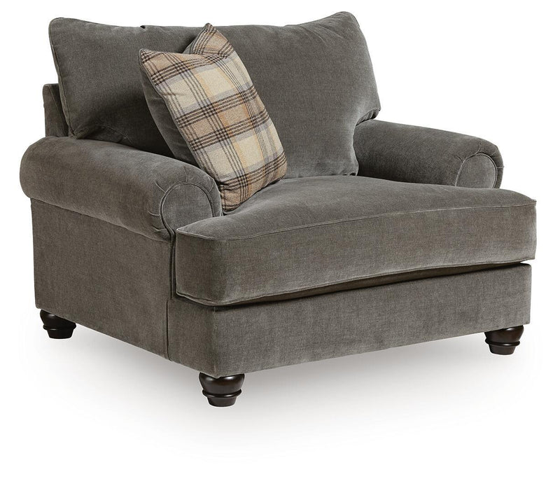 Shadow gray chair and a half with rolled arms and plaid accent pillow