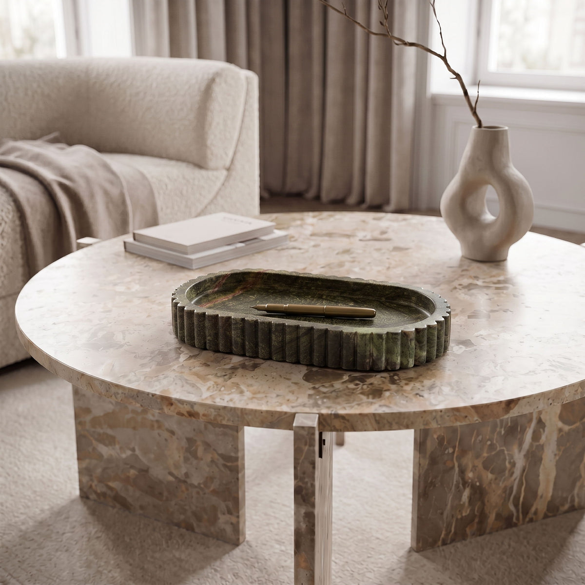 Green genuine marble tray on a round table with scalloped ridged border