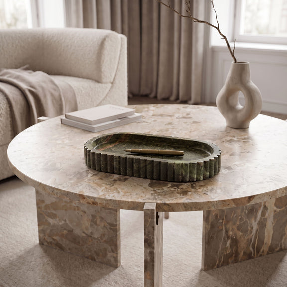 Green genuine marble tray on a round table with scalloped ridged border