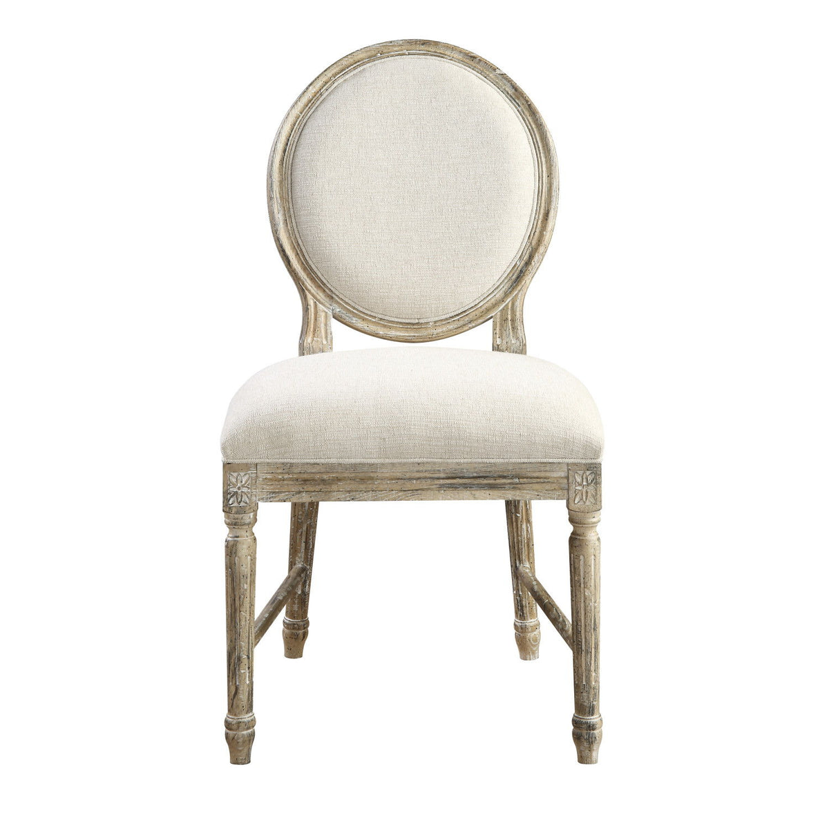 Upholstered dining chair with oval back and light beige seat cushion, distressed wooden frame