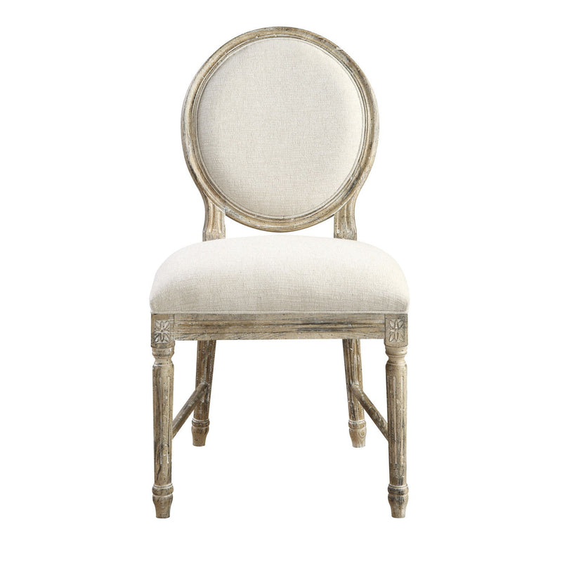 Upholstered dining chair with oval back and light beige seat cushion, distressed wooden frame