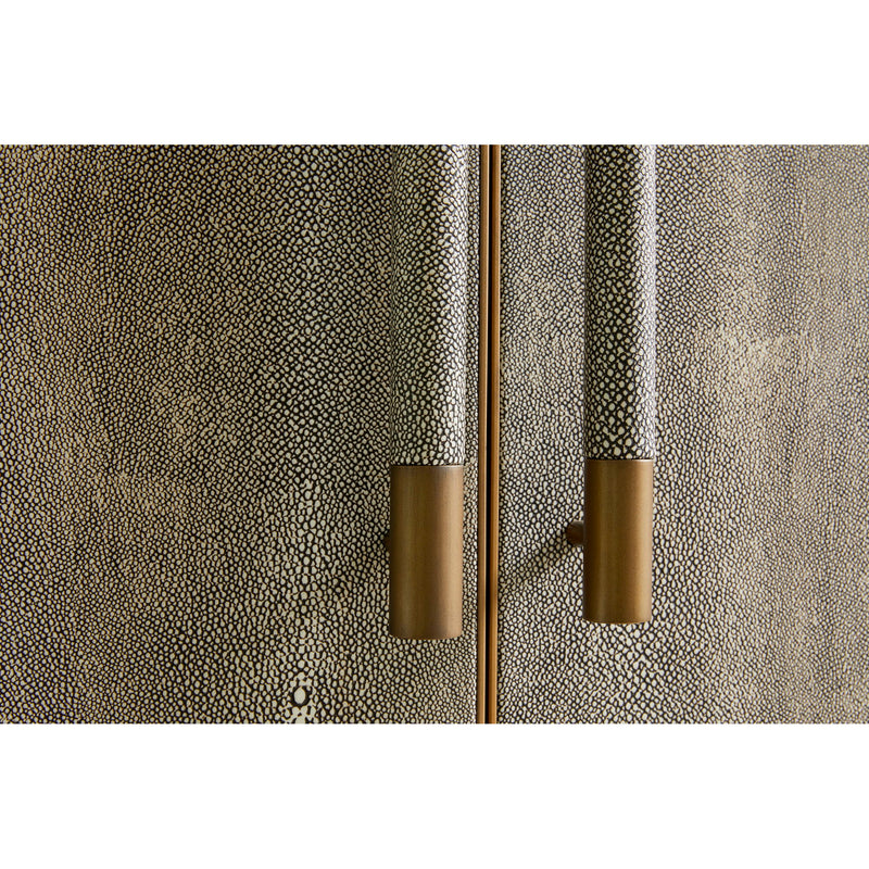 Concrete-textured gray cabinet door with brass-toned vertical bar pull handles