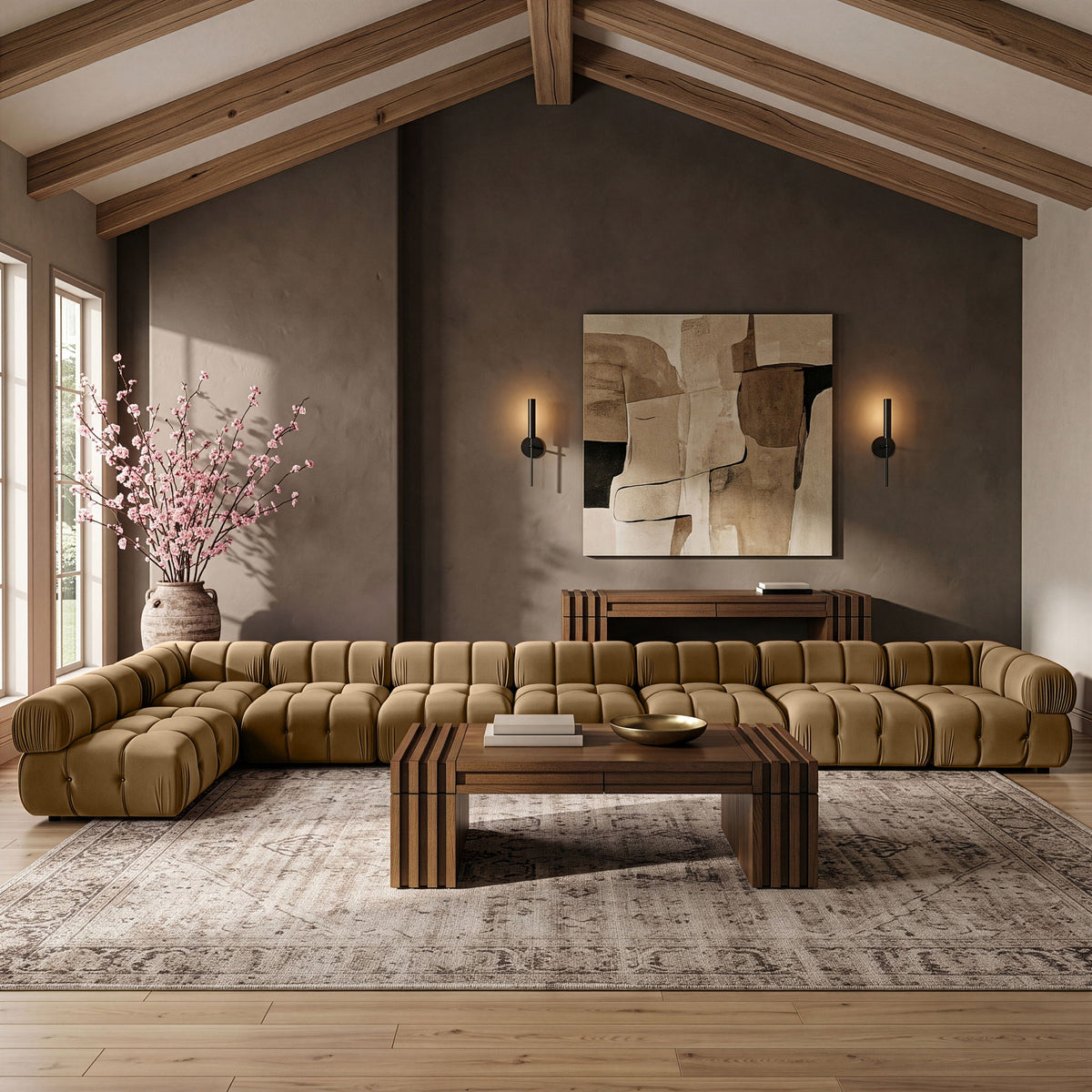 Tan velvet L-shaped sectional sofa with tufted seats and padded armrests.