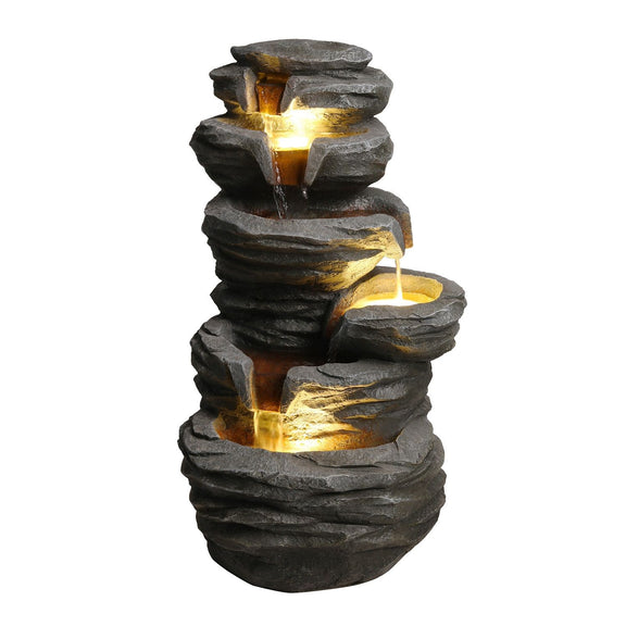 Gray stone-look outdoor waterfall fountain with tiered basins and warm LED lights