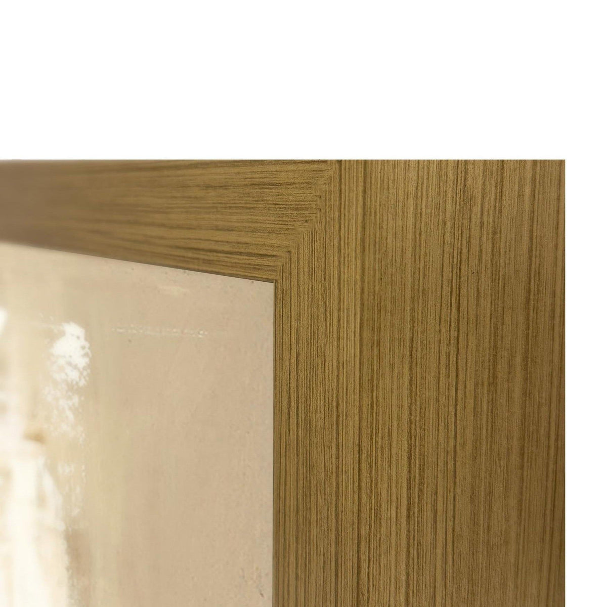 Gold wood frame corner with textured finish and recessed canvas edge.