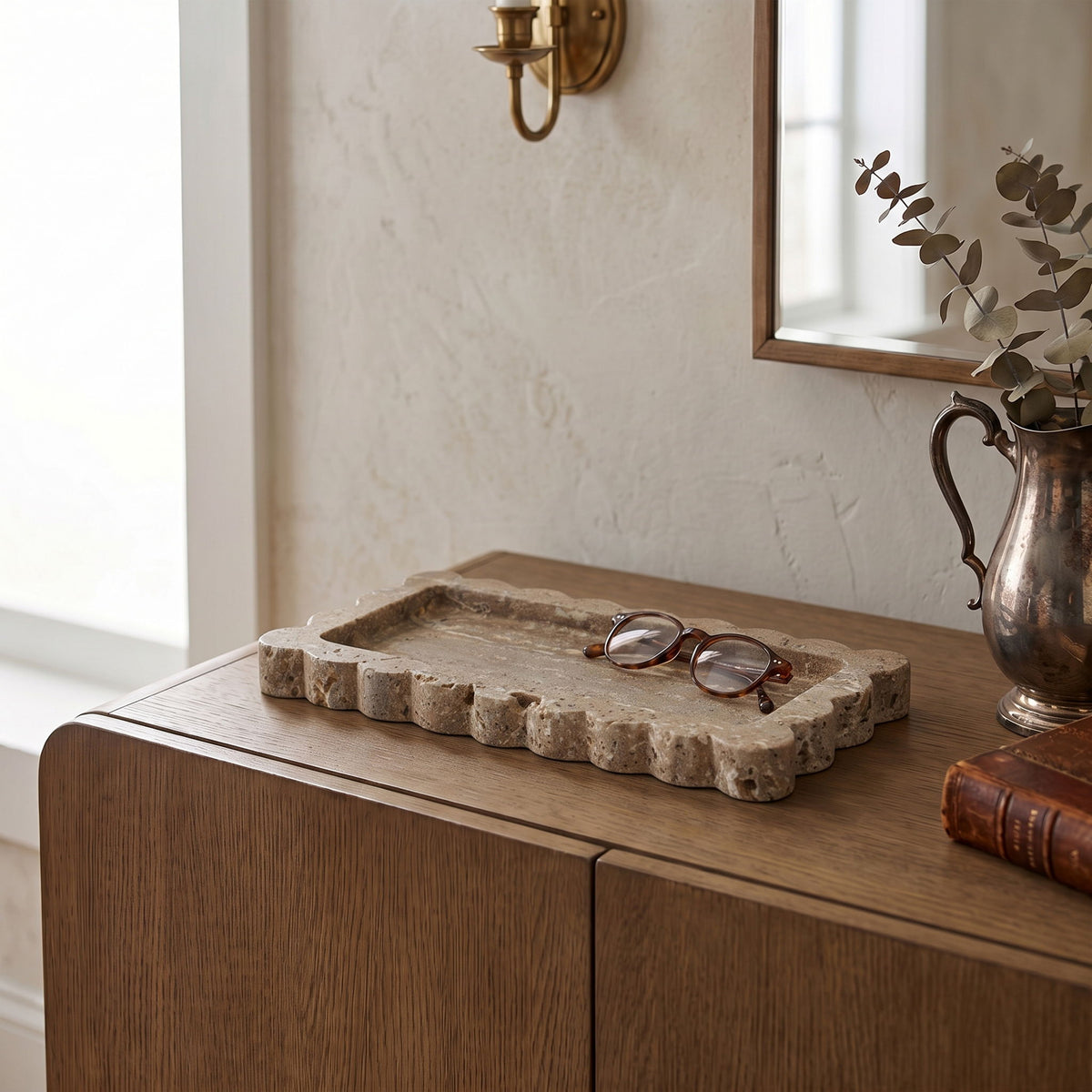 Light brown genuine marble tray with scalloped rim and rectangular center well.