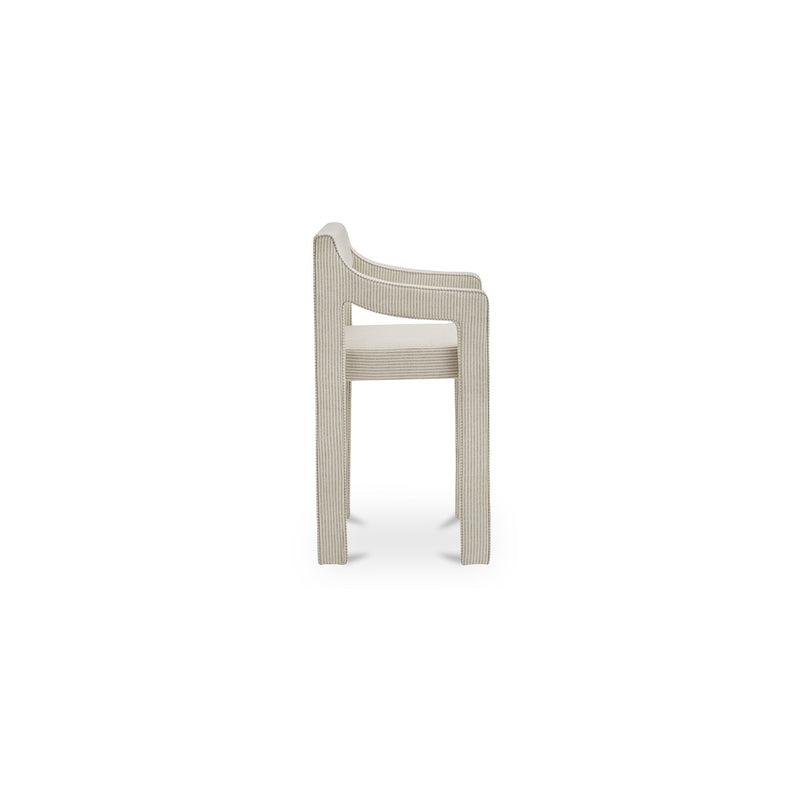 Elise counter stool in side view, showing its curved arm and striped upholstery