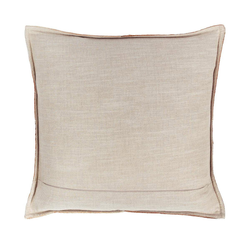 Tan fabric-backed pillow with smooth weave and stitched border