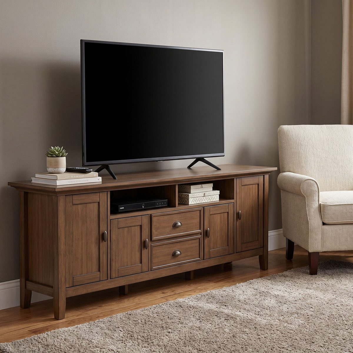 Rustic TV media stand with two cabinet doors and drawers in aged brown wood