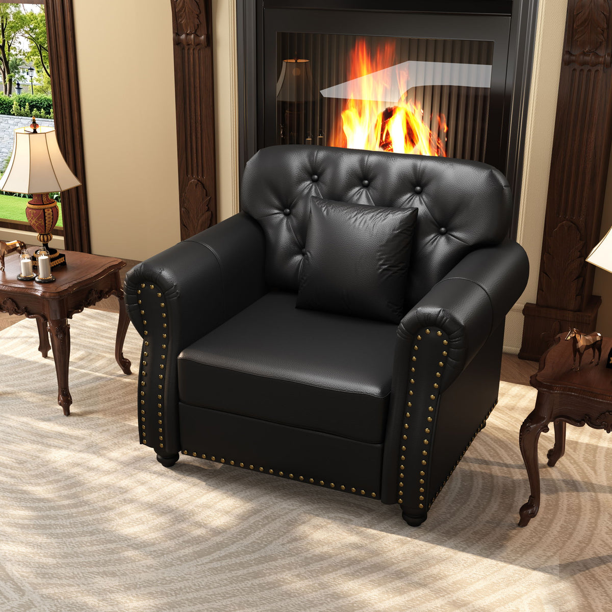 Black tufted upholstered armchair-style sofa with rolled arms and nailhead trim