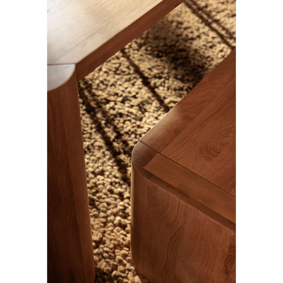 Natural wood dining bench corner detail with smooth edges and visible grain