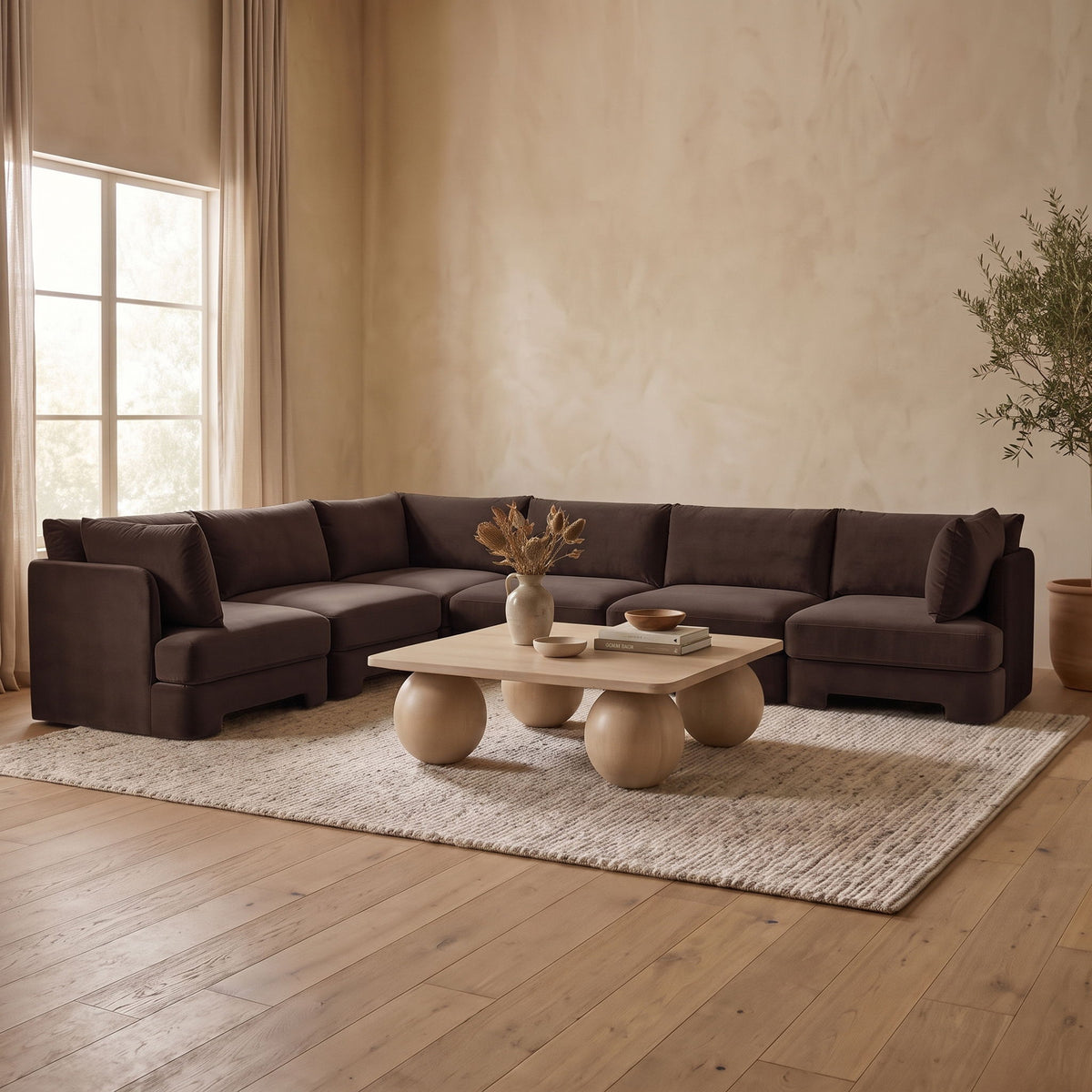 Dark brown velvet U-shaped armless sectional sofa with chaise corner and low arms