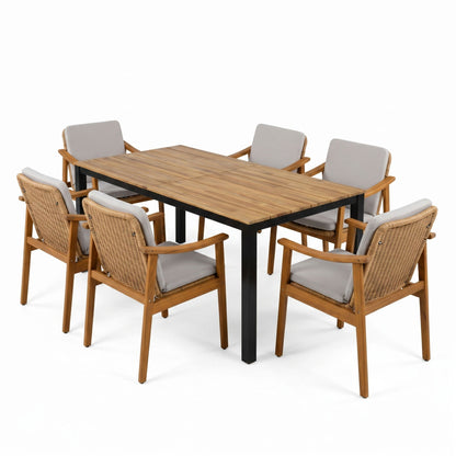 Gray outdoor dining set with rectangular wood table and six woven arm chairs, gray cushions
