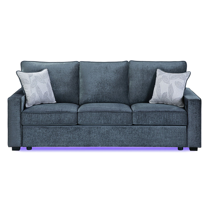 Dark blue-gray upholstered 3-seat sofa with 2 patterned throw pillows and LED base light