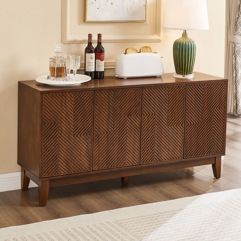 Walnut sideboard with four carved geometric doors and tapered legs