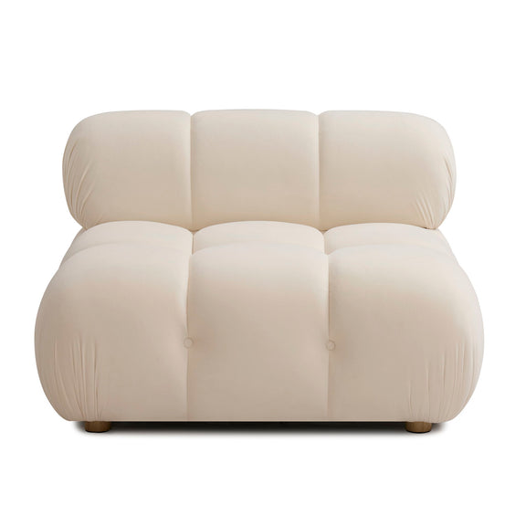 Cream armless modular chair with three padded back sections and cushioned seat front