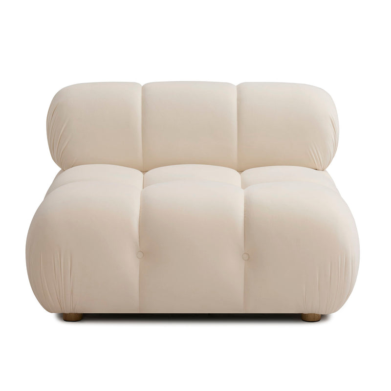Cream armless modular chair with three padded back sections and cushioned seat front