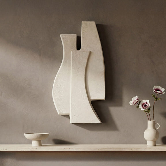Beige abstract wall sculpture with two stacked curved panels and vertical notch
