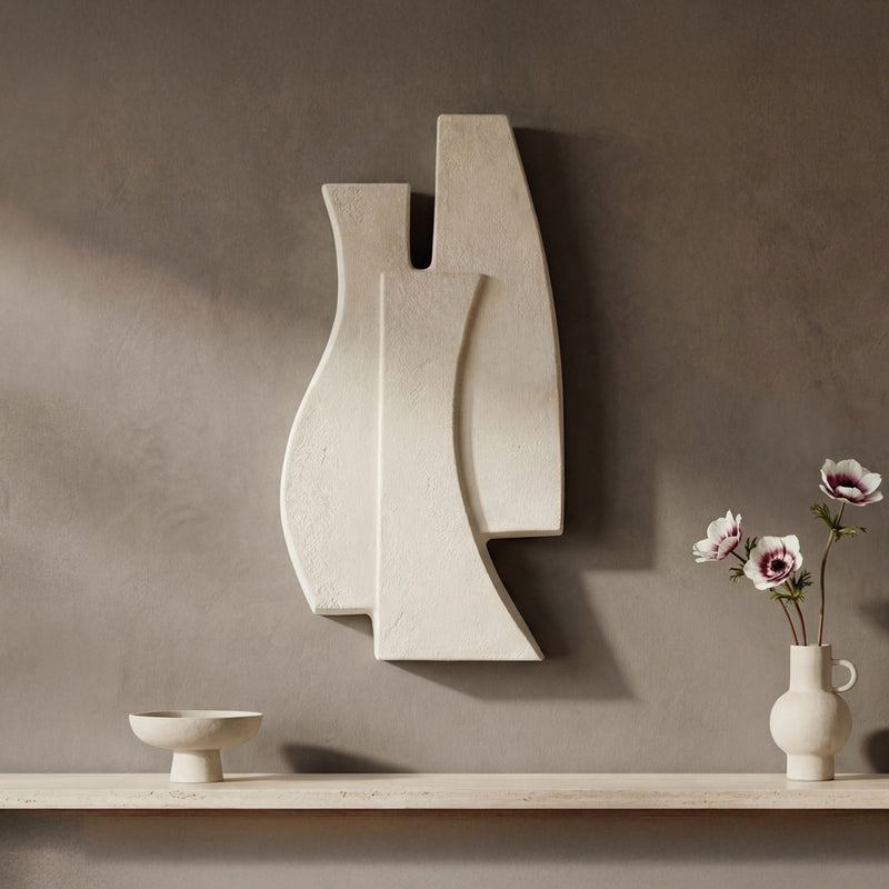 Beige abstract wall sculpture with two stacked curved panels and vertical notch