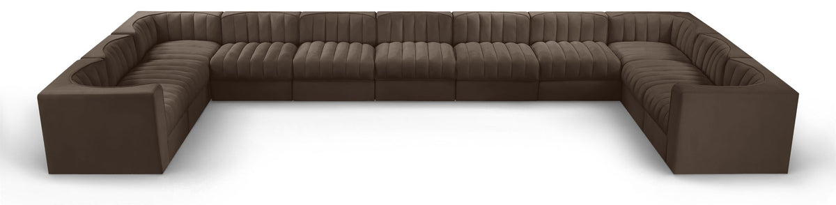 Dark brown modular sectional sofa with velvet-look upholstery and tufted cushions