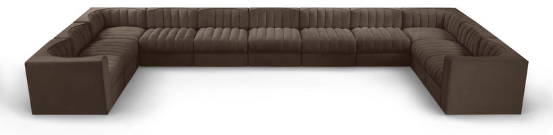 Dark brown modular sectional sofa with velvet-look upholstery and tufted cushions