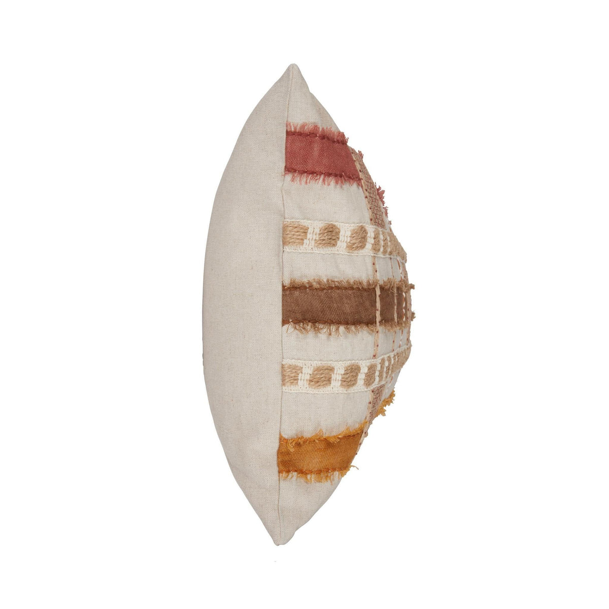 Stratton ML pillow side view, patchwork panel with orange and rust accents