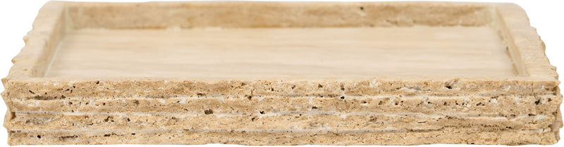 Beige travertine tray side view, layered edge and smooth top surface.