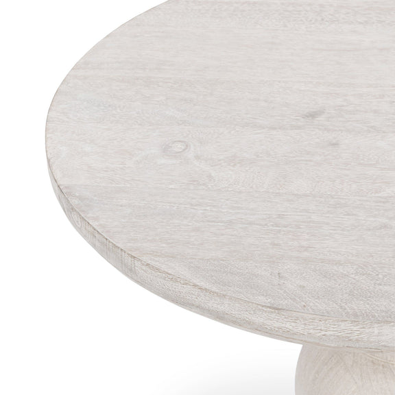 Creamwood round tabletop surface close-up with fine wood grain lines
