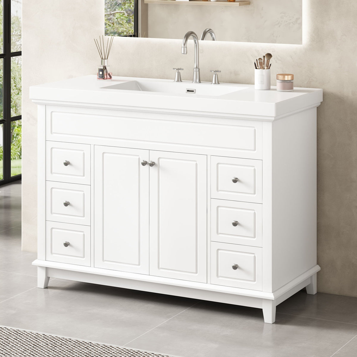 White bathroom vanity with double doors and six drawers, integrated sink and countertop