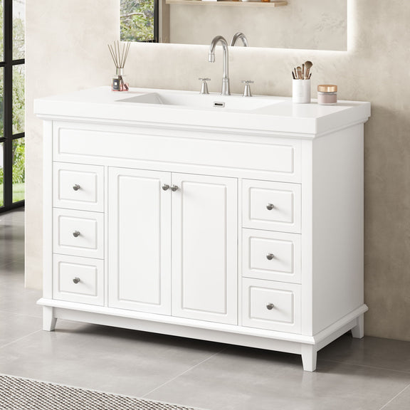 White bathroom vanity with double doors and six drawers, integrated sink and countertop