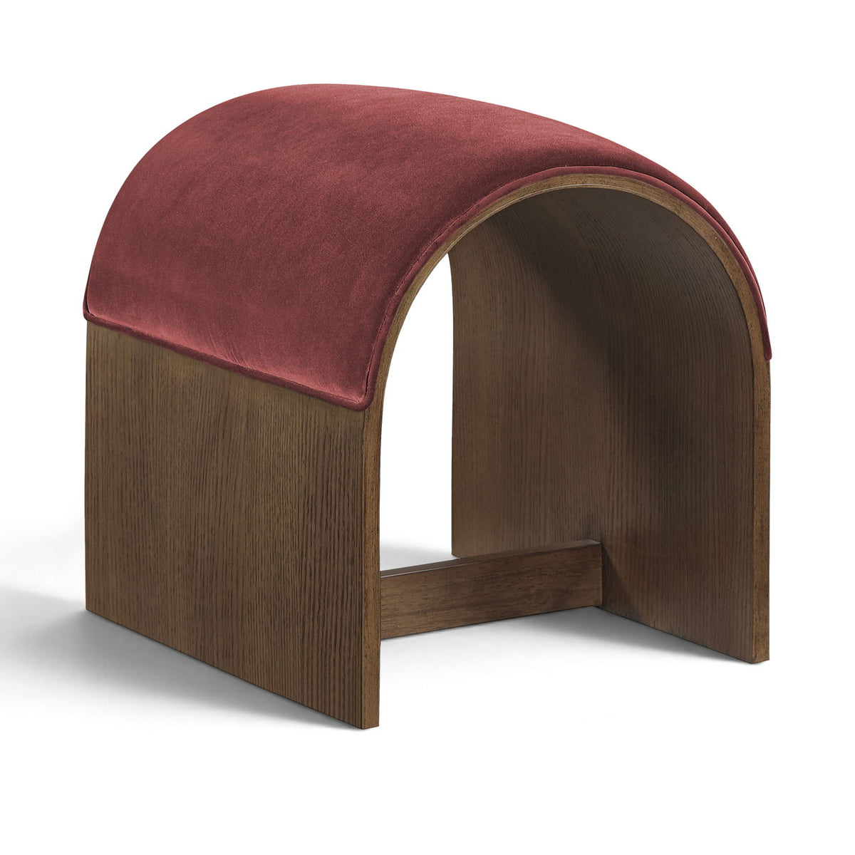 Burgundy velvet upholstered bench with arched back and dark wood base, open center
