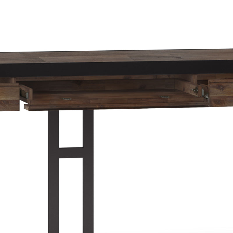 Underside view of rustic brown desk with drawer hardware and dark metal legs