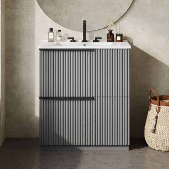 Dark gray fluted bathroom vanity with ceramic sink and two-door cabinet front view