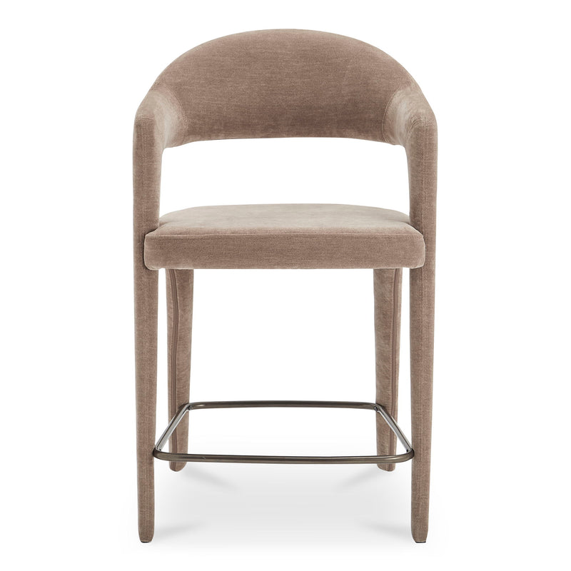 Martens camel upholstered counter stool with curved back, arms, and metal footrest.