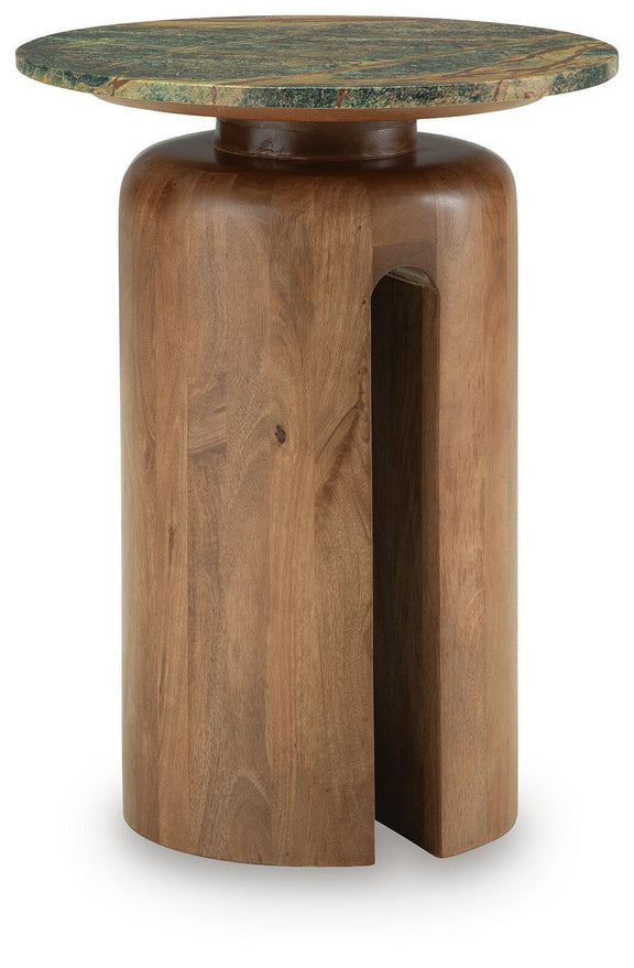 Brown wood accent table with round green patterned top and side cutout pedestal