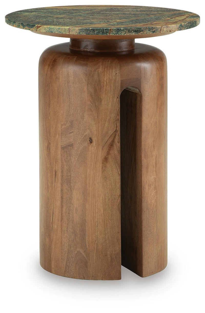 Brown wood accent table with round green patterned top and side cutout pedestal