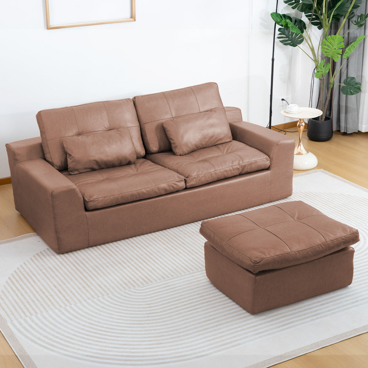 Light brown L-shaped sofa with movable ottoman; tufted cushions and padded seats