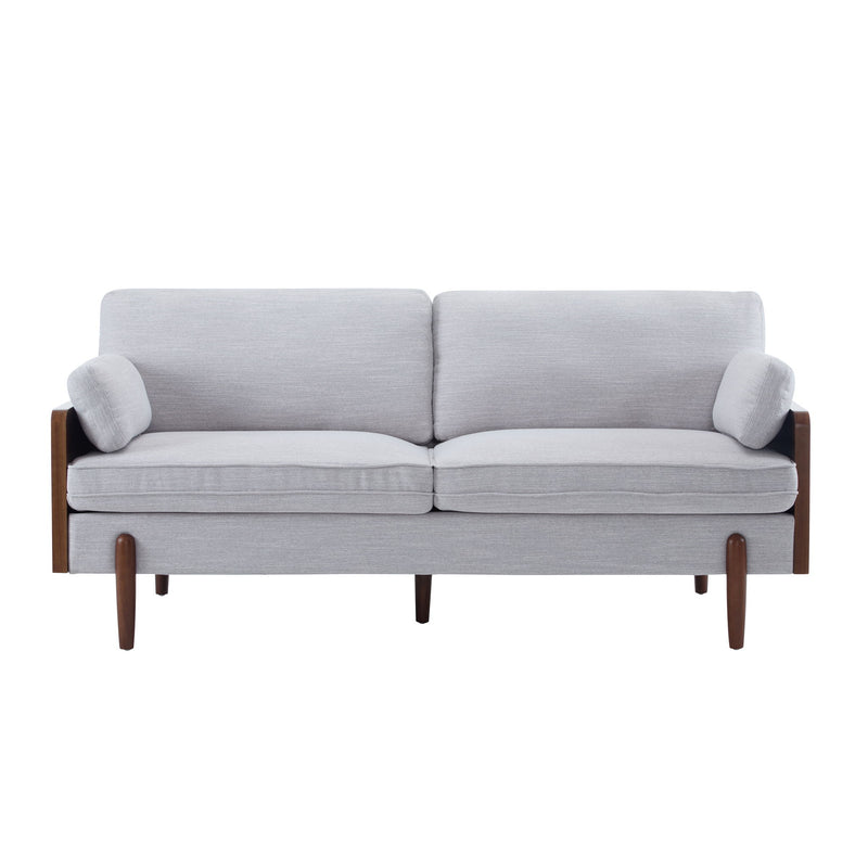 Light gray upholstered sofa with rolled arm cushions and dark wood tapered legs