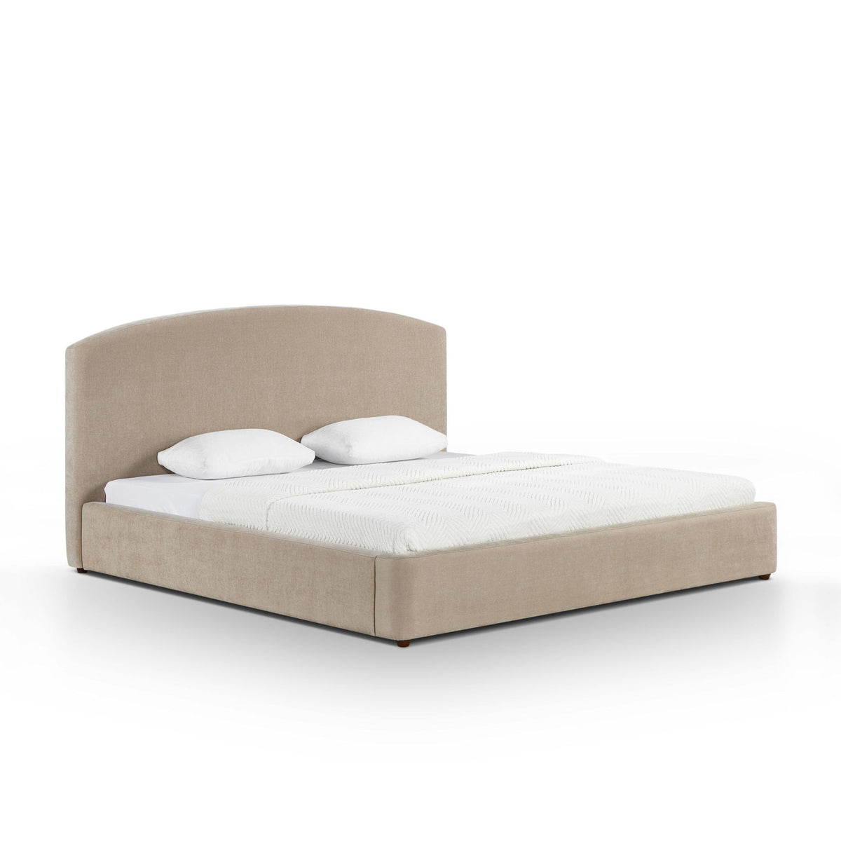 Light brown upholstered bed frame with curved headboard, white pillows and duvet