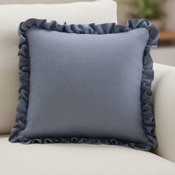 Blue square cushion pillow with ruffled trim along the edges