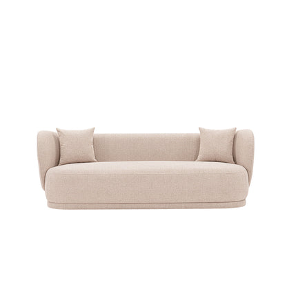 Beige sofa with two square accent pillows, rounded arms, and low platform base.