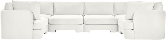 White velvet U-shaped sectional sofa, 6-piece set with upholstered back and arm cushions.