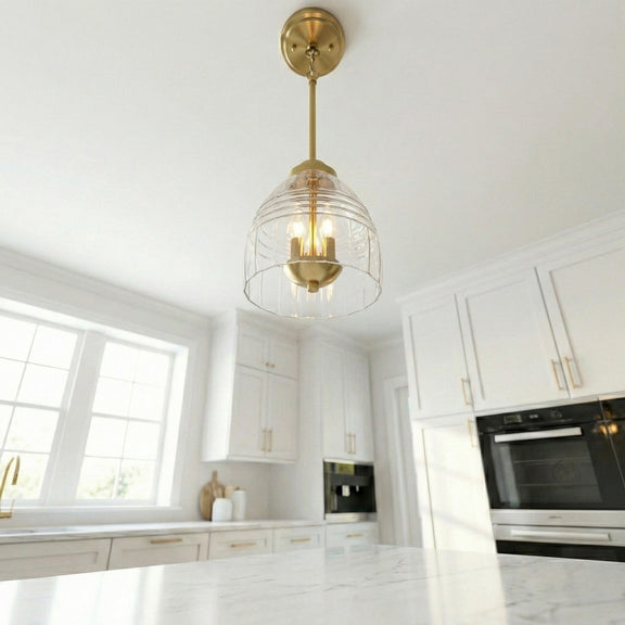 Gold ceiling-mount chain pendant with clear glass globe and three candle bulbs